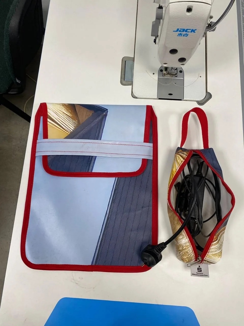 Carry case constructed from technical advertising textile with bound edges