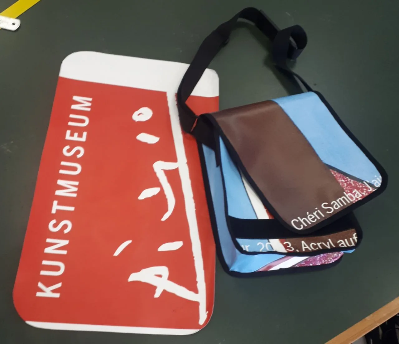 Museum advertising material transformed into messenger bags